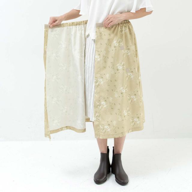 【雨グッズ】 ボトムスの濡れを防ぐ「レインスカート」が地味に便利そう！ 服の上からくるっと巻くだけだよ